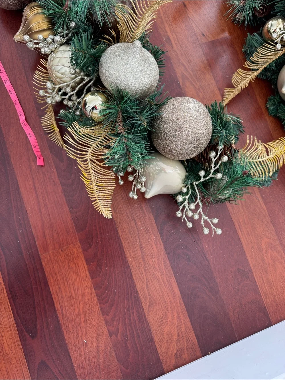 Festive Green and Gold Holiday Garland with Ornaments